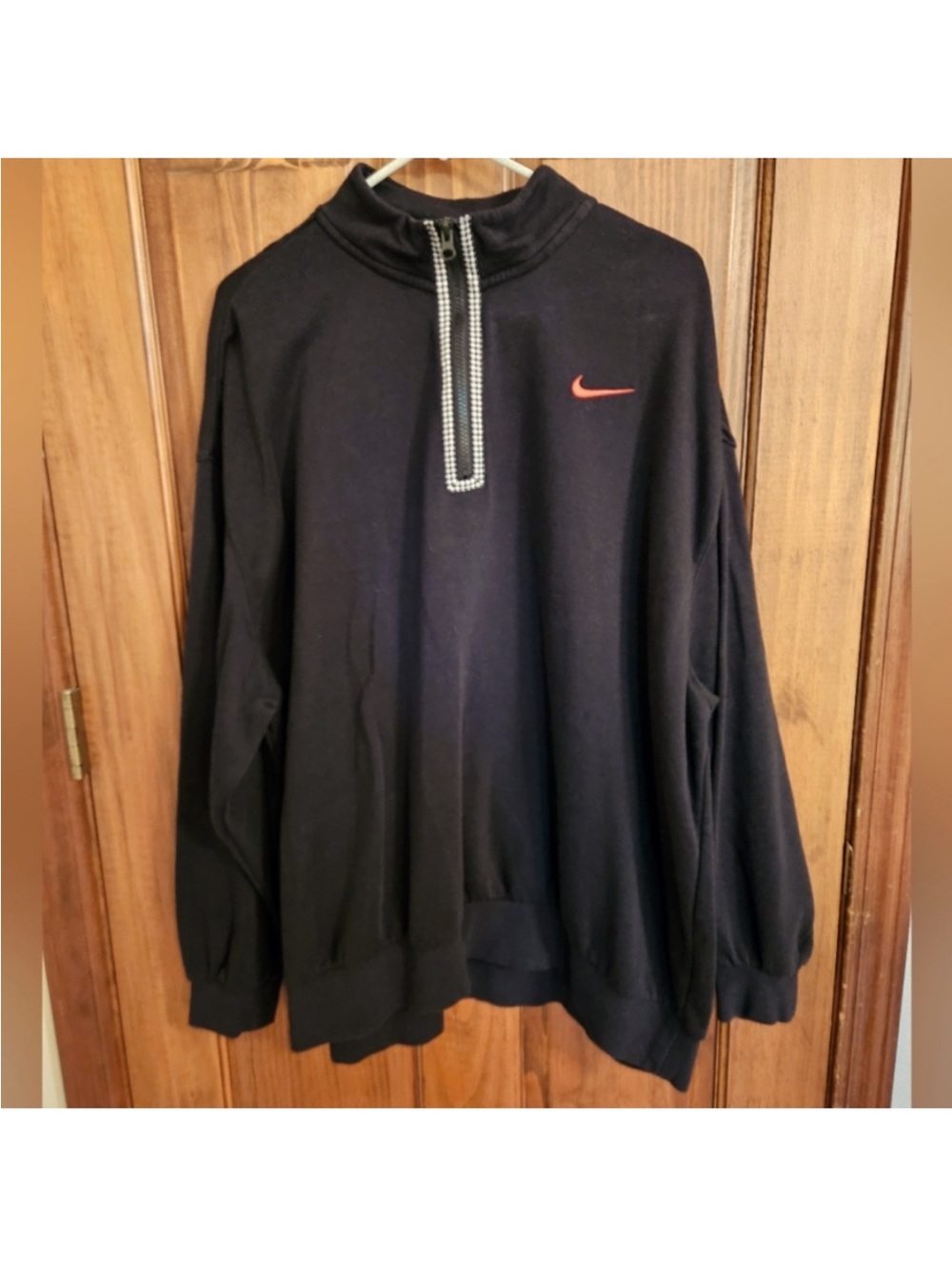 Vintage Nike Black Quarter-Zip Sweatshirt with Orange Swoosh